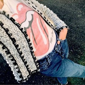 CHANEL. Black, white and navy tweed jacket.